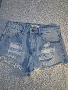 Forever 21 Ladie's distressed denim shorts w/ lace with 24" waist